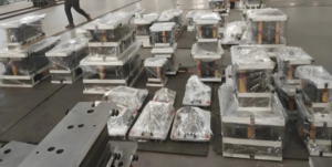 Custom injection mold for manufacturing plastic plate components