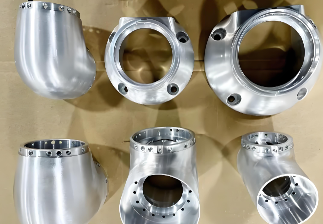 Robotic arm handling sheet metal parts in automated production line