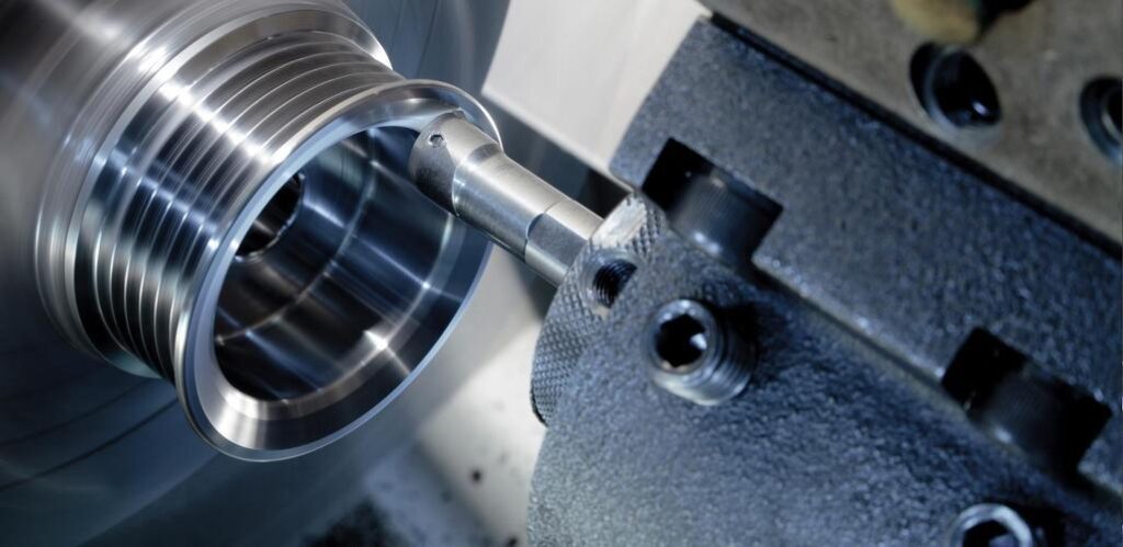 CNC lathe turning of precision metal components with tight tolerance control